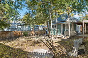 Rear view of property with a patio