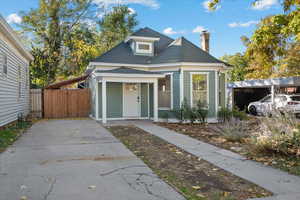 Bungalow with a carport and a porch