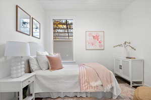 Bedroom featuring hardwood / wood-style floors and wooden ceiling