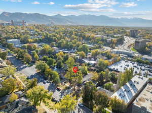 Birds eye view of property with a mountain view