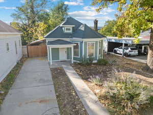 Bungalow featuring a carport