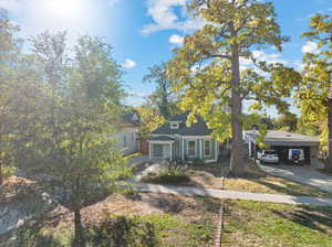 View of front of house with a carport