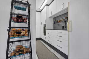 Garage built in beverage refrigerator, extra refrigerator and freezer and storage