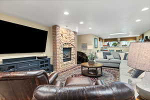 Basement Living area featuring with fireplace and sitting area