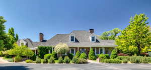 Cape cod-style house with porch