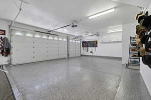 Garage built in beverage refrigerator, extra refrigerator and freezer and storage