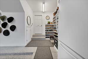 View of entrance to main level house from garage