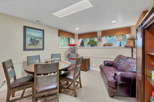 Basement Living area featuring with fireplace and sitting area