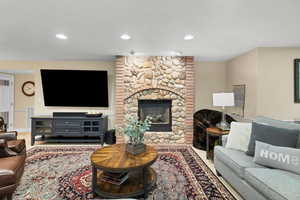 Basement Living area featuring with fireplace and sitting area