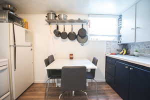 Dining space featuring dark hardwood / wood-style floors