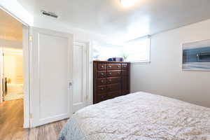 Bedroom with light wood-type flooring