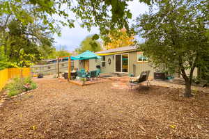 Back of house with a patio area