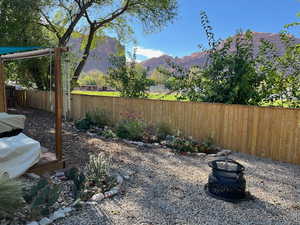 View of yard with a mountain view