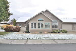 Single story home featuring a garage