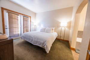 Bedroom with carpet flooring