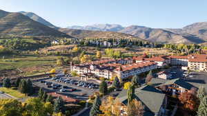 Birds eye view of property with a mountain view