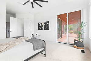 Bedroom with access to outside, light colored carpet, and ceiling fan