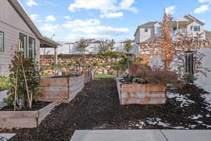 View of yard with a balcony