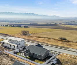 Drone / aerial view featuring a mountain view and a rural view