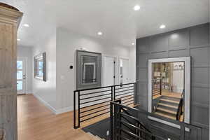 Hallway featuring light wood-type flooring