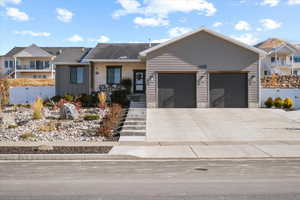 Single story home with a garage