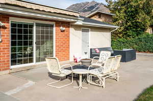 View of patio / terrace with a mountain view