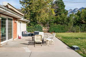 View of patio / terrace featuring a mountain view