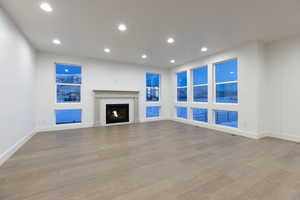 Unfurnished living room featuring light hardwood / wood-style floors