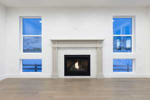 Unfurnished living room with light hardwood / wood-style flooring