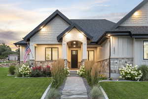 View of front facade featuring a yard