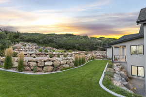 View of yard at dusk