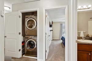 Stackable washer and dryer laundry closet.