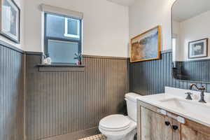 Bathroom with toilet and vanity