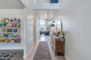 Hall featuring light hardwood / wood-style floors