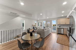 Dining space featuring light hardwood / wood-style floors