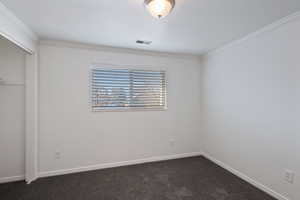 Unfurnished bedroom with new carpet