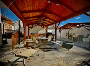 View of patio featuring a gazebo