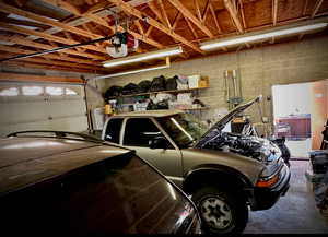 Garage featuring a garage door opener