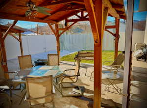 View of patio / terrace featuring ceiling fan