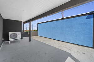 View of patio / terrace featuring ac unit