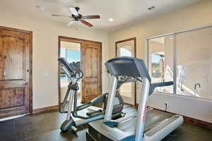 Workout area with ceiling fan