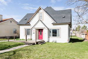 View of front of home featuring a front lawn