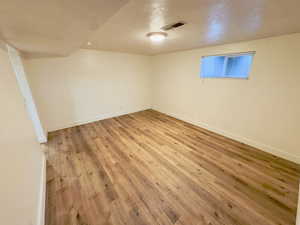 Spare room featuring light hardwood / wood-style flooring