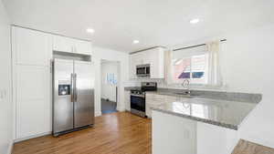 Kitchen with sink, stainless steel appliances - all appliances were bought this year and are included.