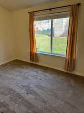 View of carpeted spare room