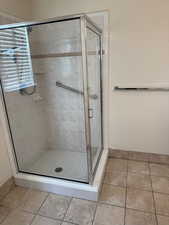 Bathroom featuring a shower with shower door