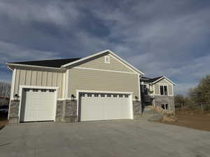 Craftsman-style house featuring a garage