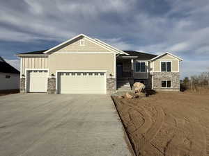 Craftsman-style home featuring a garage