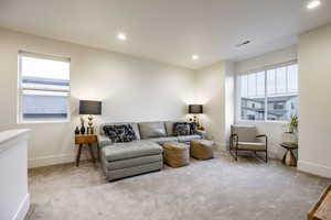 Living room with light carpet