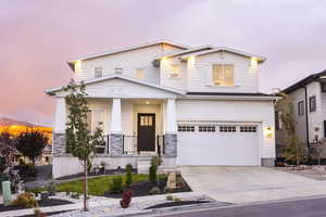 Craftsman house with covered porch and a garage